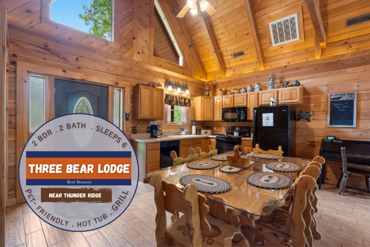 A warmly lit space featuring a wooden dining table, modern kitchen appliances, and a vaulted ceiling. The setting is perfect for family meals, game nights, or collaborative cooking, with a homey atmosphere that invites guests to linger and connect.